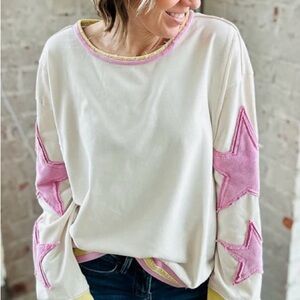 Stylish White Sweatshirt with Pink Star Accents